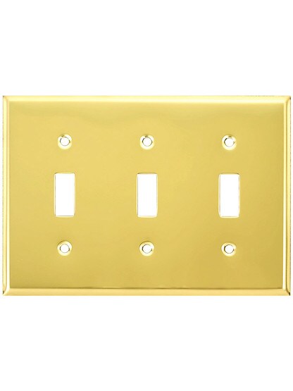 Classic Triple Toggle Switch Plate In Polished Brass.